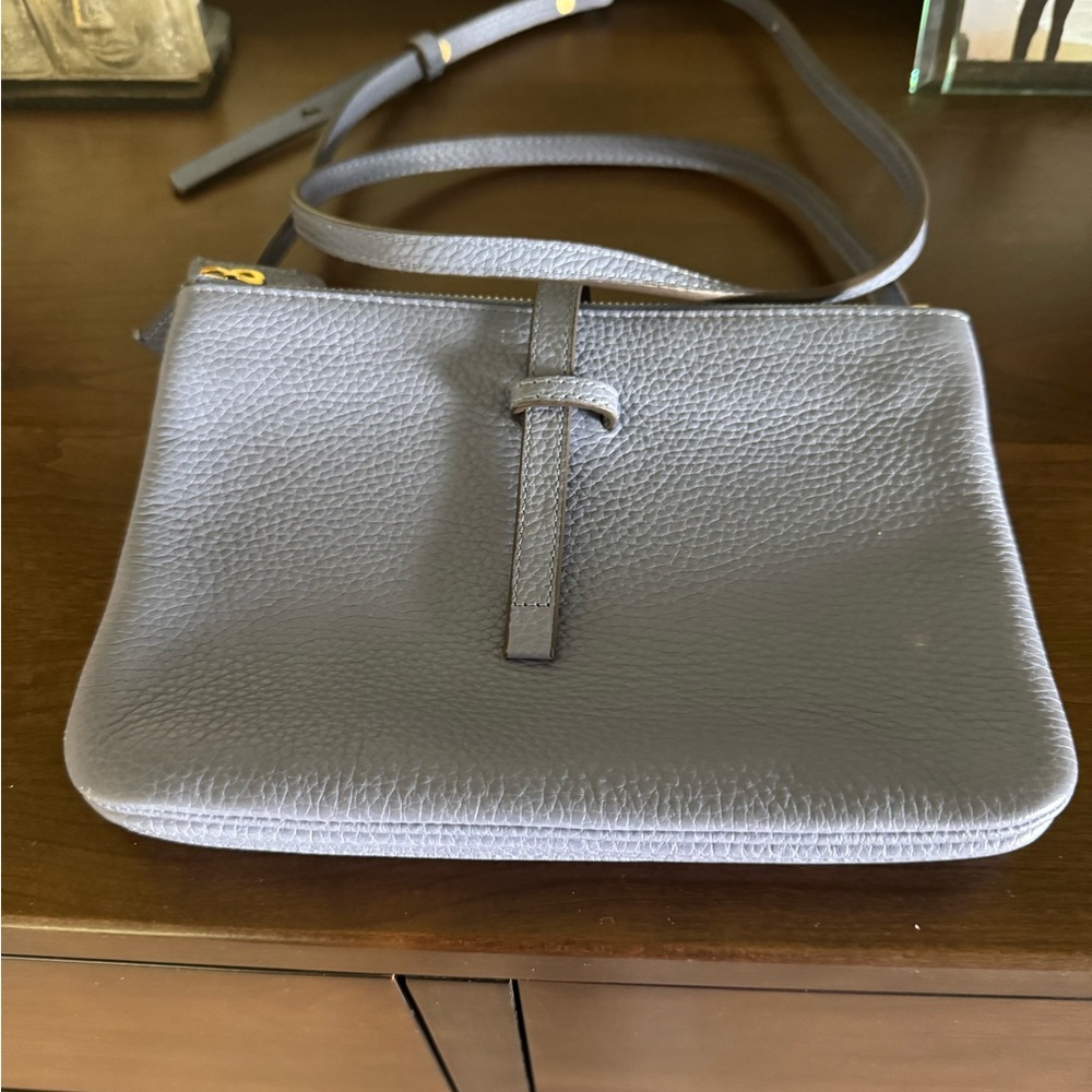 Chic Blue Pebbled Leather Crossbody Bag with Tab Closure